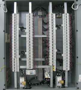 Dual dc distribution buses with kirk-key interlocked main breakers and tie breaker.